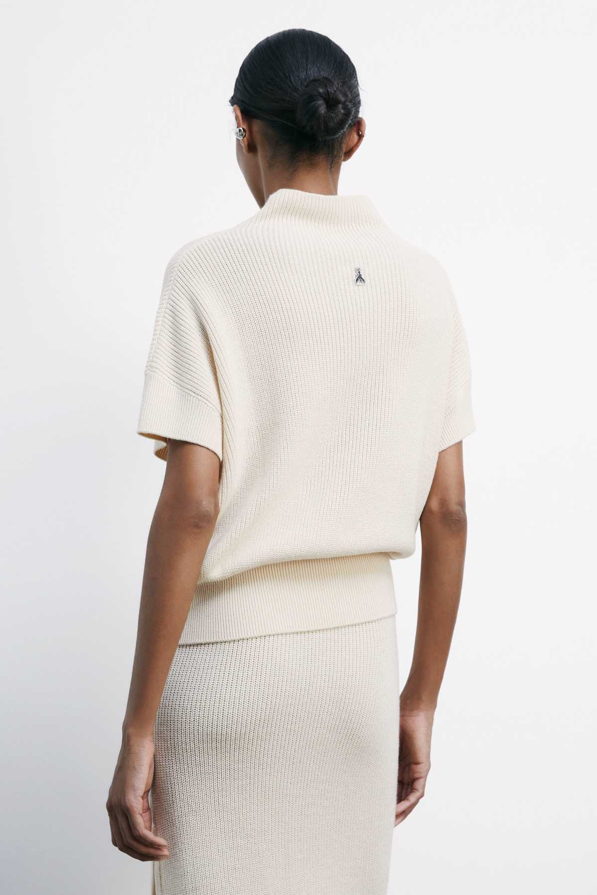 Top Smanicato in Maglia / Avorio - Ideal Moda
