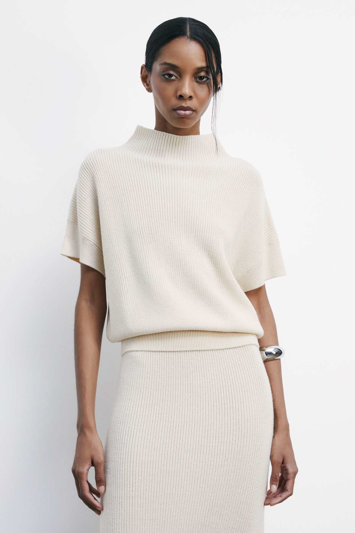 Top Smanicato in Maglia / Avorio - Ideal Moda
