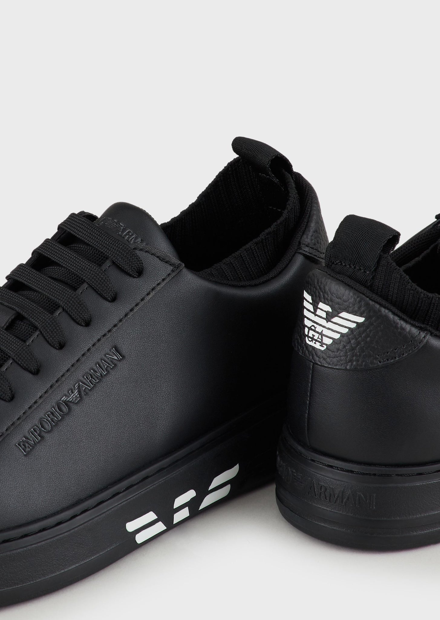 Sneakers in pelle con inserto maglia / Nero - Ideal Moda