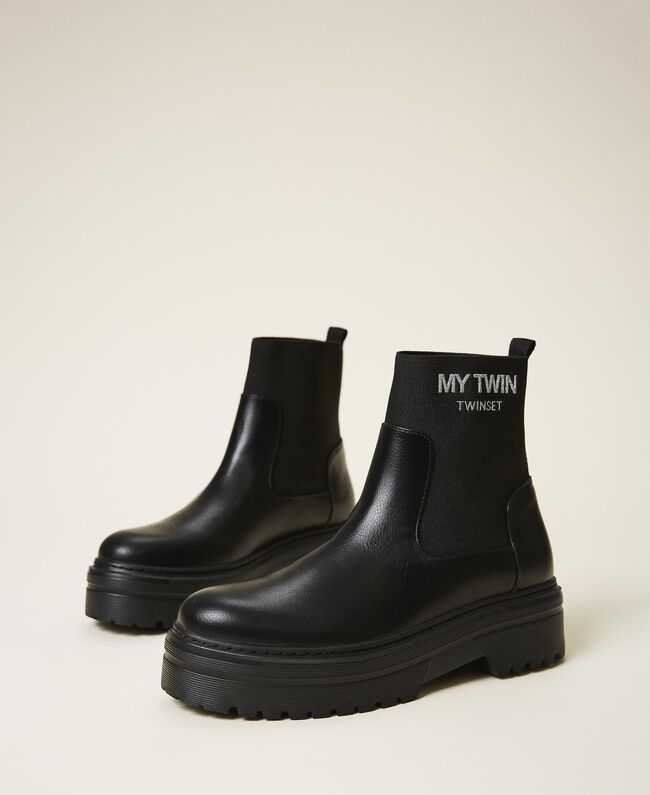 Stivaletti in similpelle con calza e logo / Nero - Ideal Moda