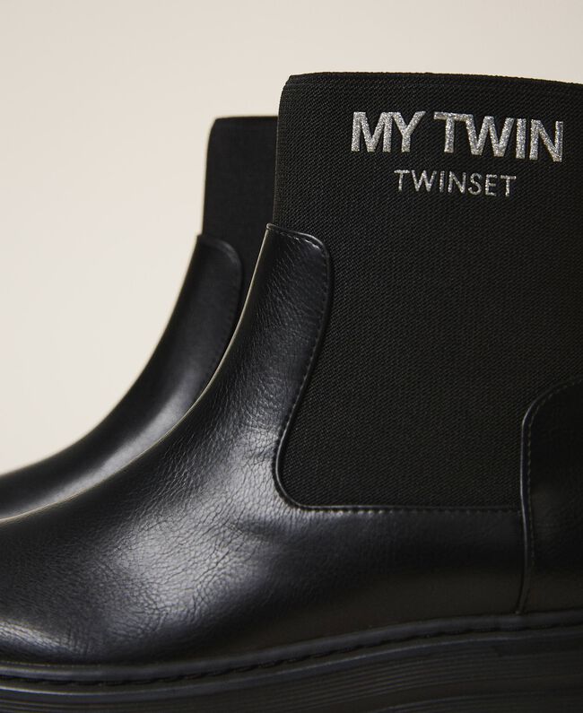 Stivaletti in similpelle con calza e logo / Nero - Ideal Moda