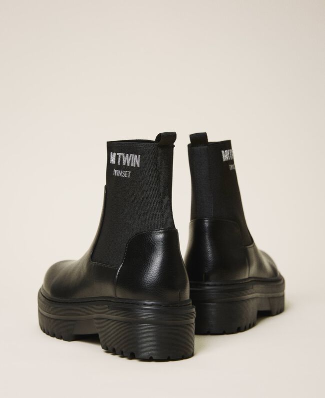 Stivaletti in similpelle con calza e logo / Nero - Ideal Moda