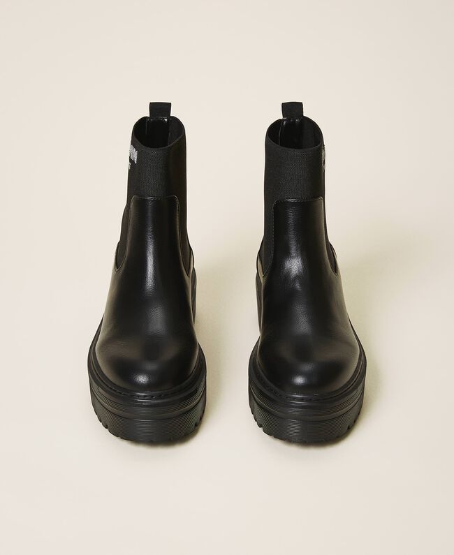 Stivaletti in similpelle con calza e logo / Nero - Ideal Moda
